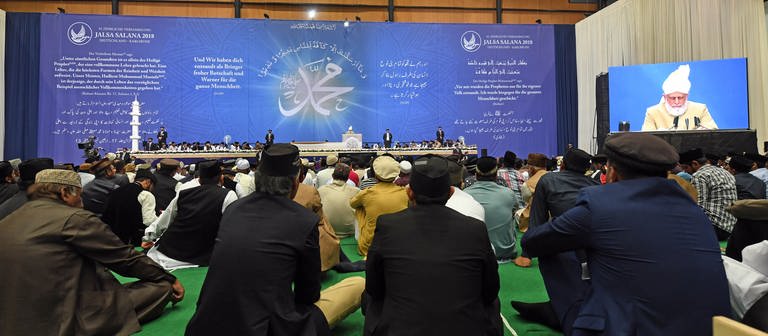 Ahmadiyya Konferenz in Karlsruhe (Foto: dpa Bildfunk, picture alliance/dpa | Uli Deck)